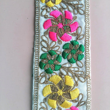Off White Fabric Trim With Bronze, Green, Pink And Blue/Yellow Floral Embroidery